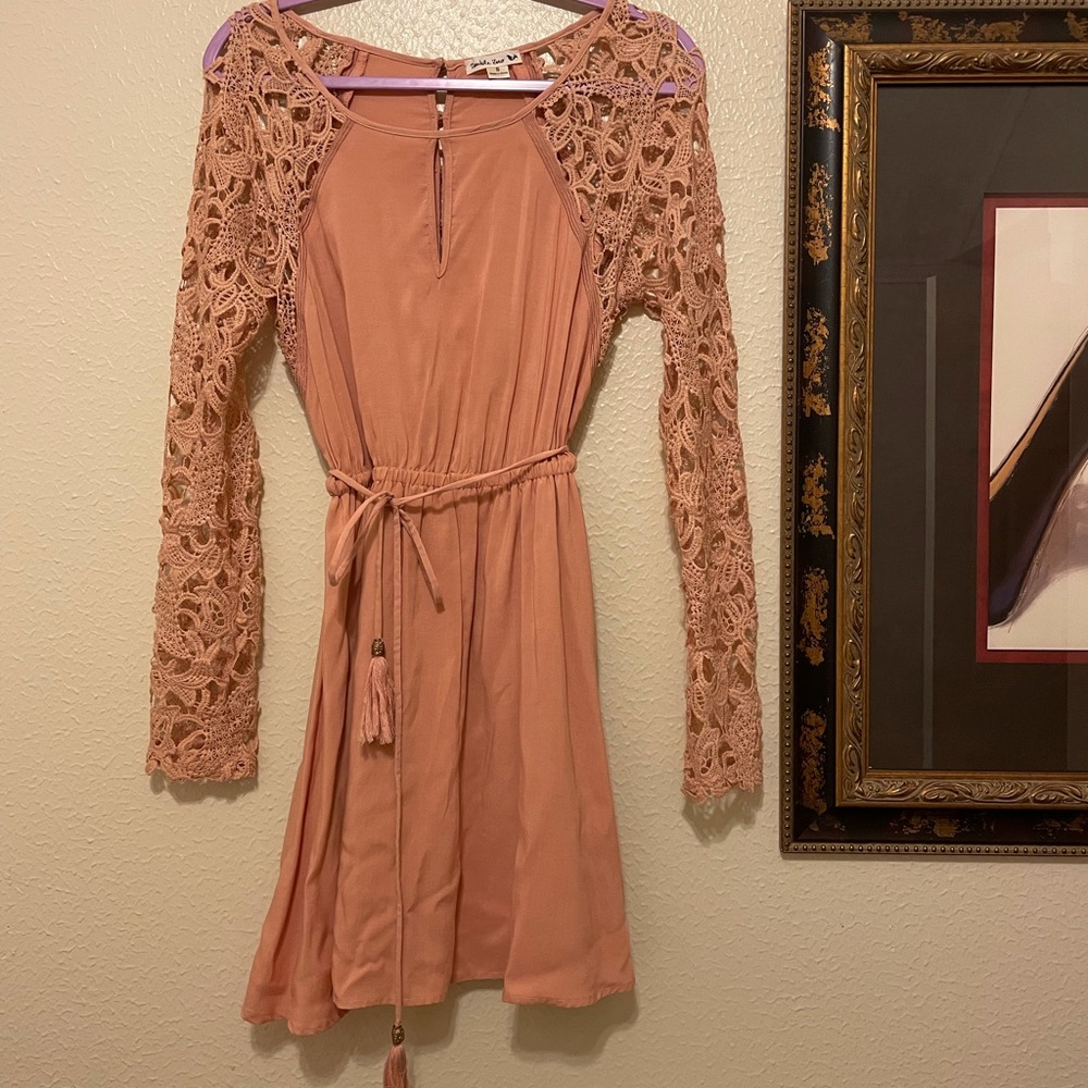 The sweetest blush dress! It’s from a boutique in Austin TX. Has been worn once!